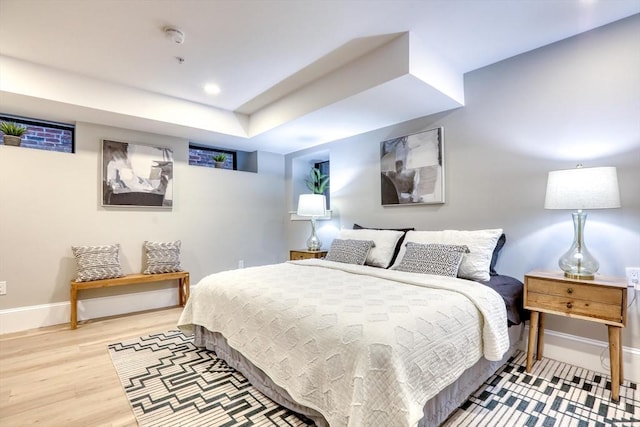 bedroom with light hardwood / wood-style floors