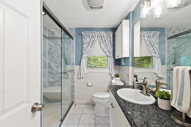 5-R Valeda, Rehoboth, MA 02769 - bathroom featuring vanity, toilet, a shower stall, tile walls, and a chandelier