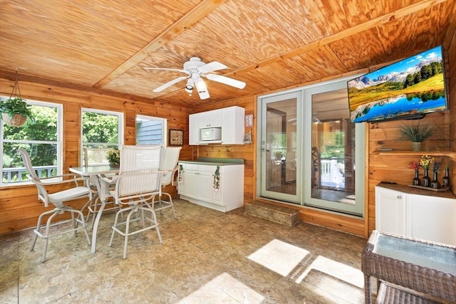5-R Valeda, Rehoboth, MA 02769 - dining space featuring wooden ceiling, wood walls, and a ceiling fan