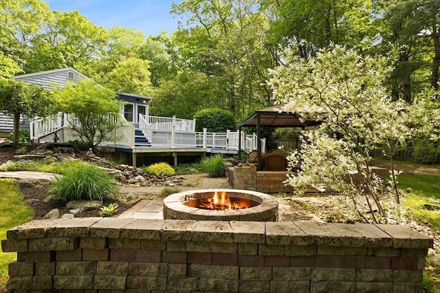 5-R Valeda, Rehoboth, MA 02769 - back of property featuring a gazebo, a deck, and an outdoor fire pit