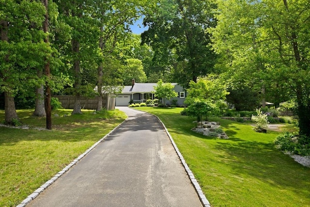 5-R Valeda, Rehoboth, MA 02769 - view of front facade featuring a garage and driveway