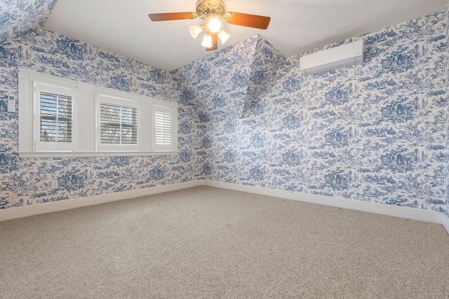 carpeted empty room with an AC wall unit and ceiling fan