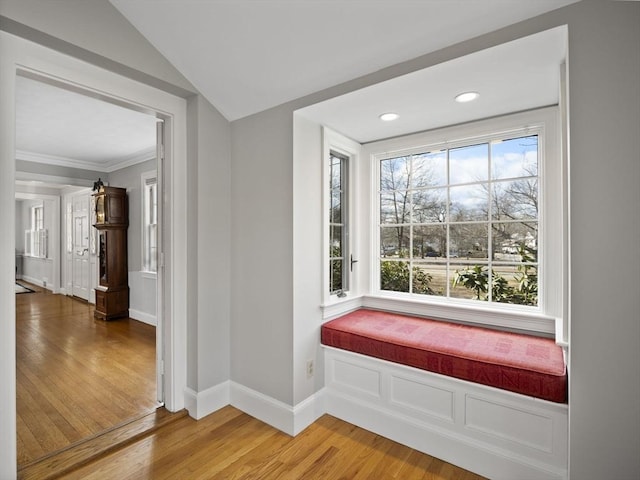 interior space featuring crown molding, recessed lighting, baseboards, and light wood-type flooring