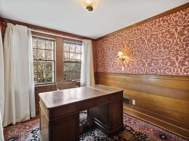 office with a wainscoted wall, wood walls, wallpapered walls, and ornamental molding