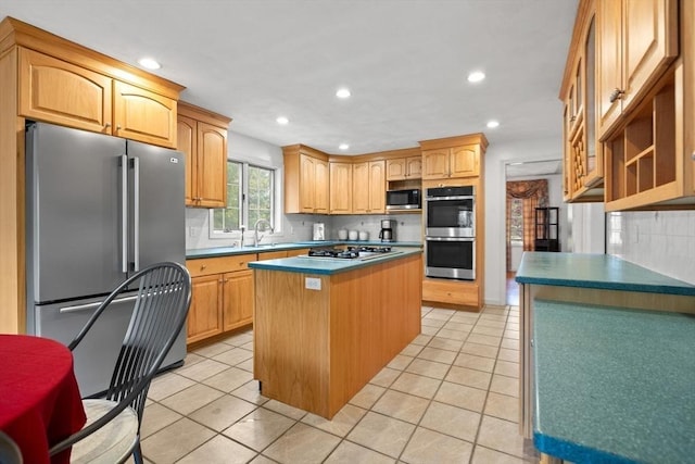 5 Campbell Rd, Middleton, MA 01949 - kitchen featuring stainless steel appliances, a kitchen island, recessed lighting, light tile patterned flooring, and backsplash
