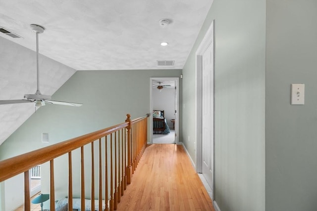 5 Campbell Rd, Middleton, MA 01949 - corridor featuring light wood finished floors, vaulted ceiling, and baseboards