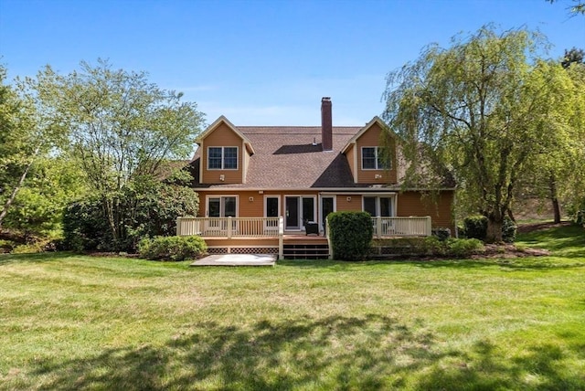 5 Campbell Rd, Middleton, MA 01949 - back of property featuring a deck, a chimney, and a yard