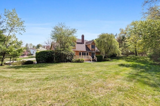 5 Campbell Rd, Middleton, MA 01949 - view of grassy yard with a deck
