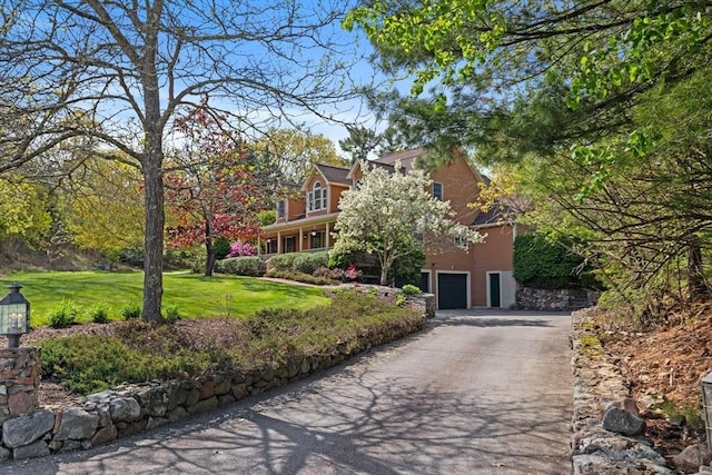 5 Campbell Rd, Middleton, MA 01949 - view of front facade featuring driveway, a front yard, and a garage