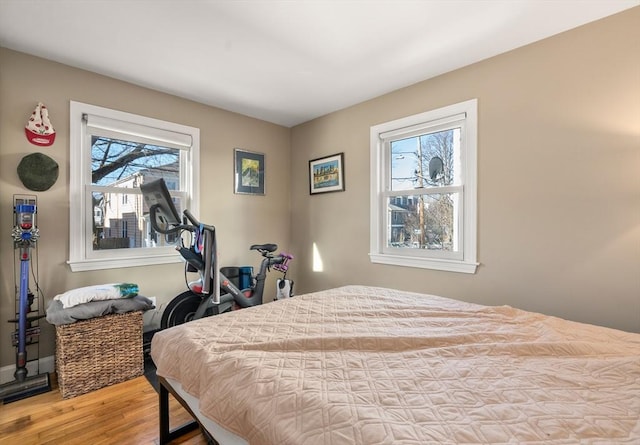 bedroom featuring wood finished floors