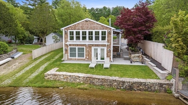 166 Klondike Rd, Dudley, MA 01571 - back of property featuring french doors, a patio area, and a deck with water view