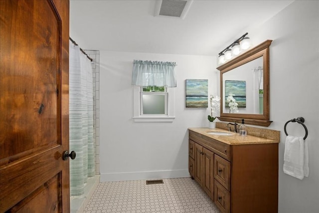 166 Klondike Rd, Dudley, MA 01571 - full bath featuring tile patterned floors, baseboards, vanity, and a shower with curtain