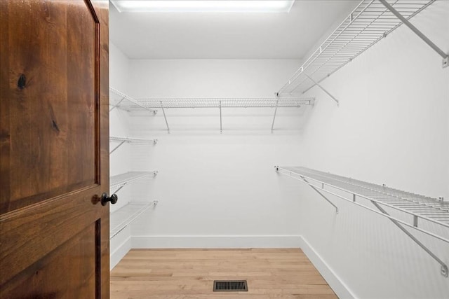 166 Klondike Rd, Dudley, MA 01571 - walk in closet with light wood finished floors