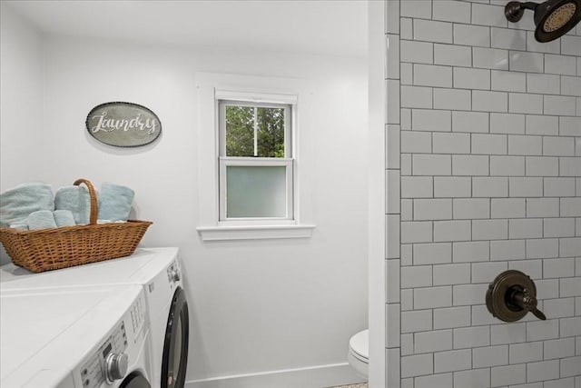 166 Klondike Rd, Dudley, MA 01571 - bathroom featuring separate washer and dryer, toilet, tiled shower, baseboards, and vanity