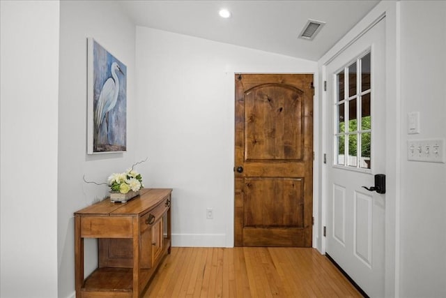 166 Klondike Rd, Dudley, MA 01571 - entryway featuring light wood-type flooring, vaulted ceiling, baseboards, and recessed lighting