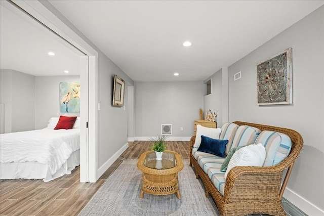 166 Klondike Rd, Dudley, MA 01571 - sitting room with wood finished floors, baseboards, and recessed lighting