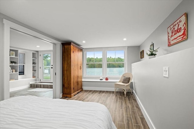 166 Klondike Rd, Dudley, MA 01571 - bedroom featuring wood finished floors, baseboards, and recessed lighting