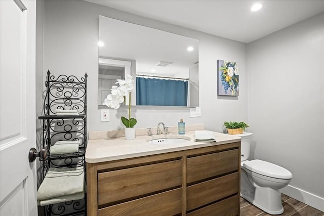 166 Klondike Rd, Dudley, MA 01571 - bathroom with wood finished floors, toilet, recessed lighting, vanity, and a shower with curtain