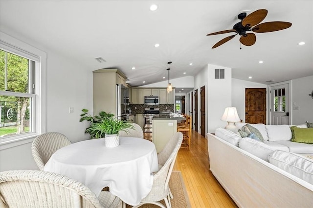 166 Klondike Rd, Dudley, MA 01571 - dining area featuring recessed lighting, vaulted ceiling, healthy amount of natural light, a ceiling fan, and light wood finished floors