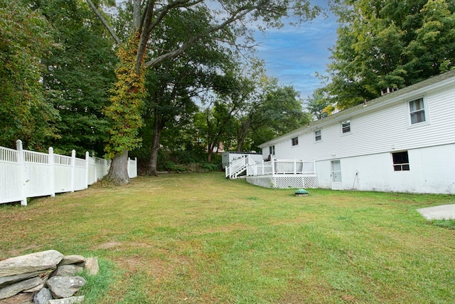 view of yard featuring a deck