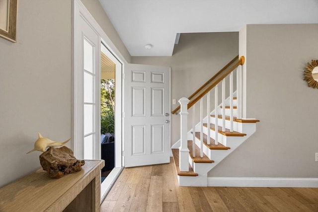 15 Littlefield Pond Rd, Harwich, MA 02645 - entryway with light wood-style floors and stairway