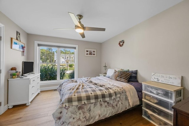 15 Littlefield Pond Rd, Harwich, MA 02645 - bedroom with light wood finished floors and ceiling fan