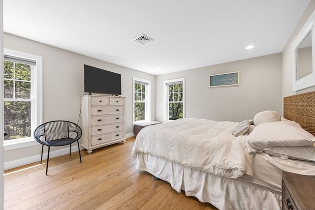 15 Littlefield Pond Rd, Harwich, MA 02645 - bedroom featuring light wood-style floors, multiple windows, and recessed lighting
