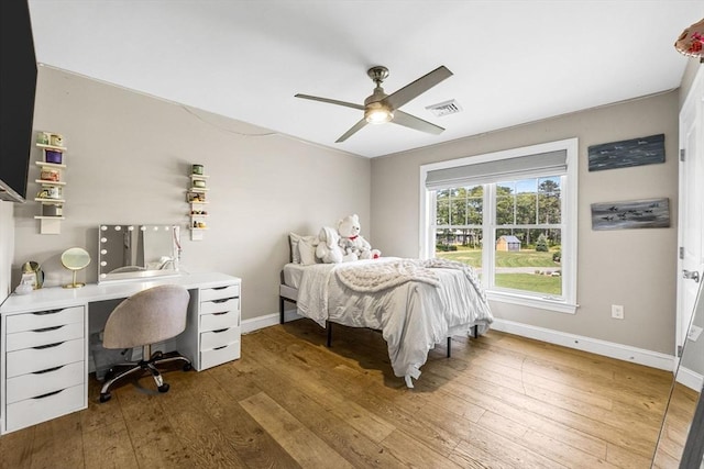 15 Littlefield Pond Rd, Harwich, MA 02645 - bedroom with hardwood / wood-style flooring, ceiling fan, and a desk