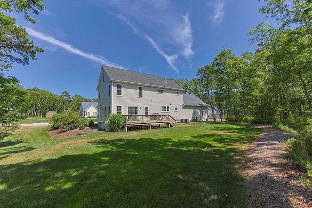 15 Littlefield Pond Rd, Harwich, MA 02645 - rear view of house with a deck and a yard
