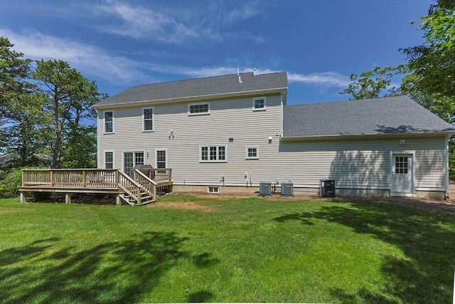 15 Littlefield Pond Rd, Harwich, MA 02645 - rear view of property with a wooden deck, a yard, and a shingled roof