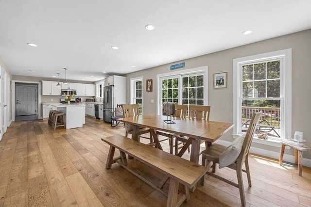 15 Littlefield Pond Rd, Harwich, MA 02645 - dining space with light wood-style floors and recessed lighting