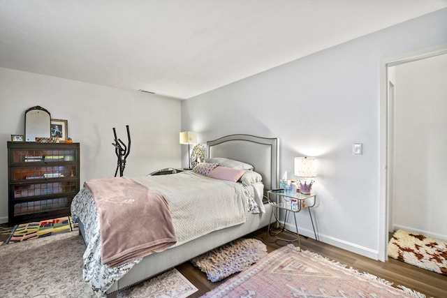 bedroom featuring hardwood / wood-style flooring