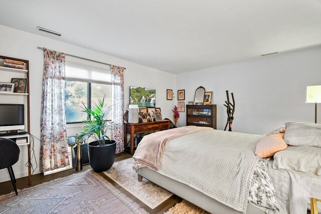 bedroom featuring hardwood / wood-style floors