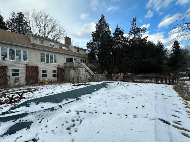 view of yard covered in snow