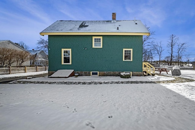 view of snow covered property