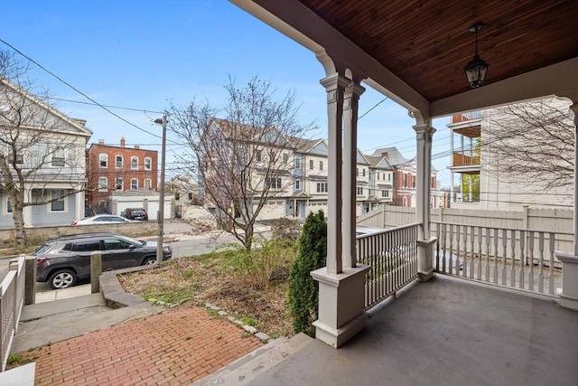 31 Millmont St Unit 1, Boston, MA 02119 - view of patio with a porch and a residential view