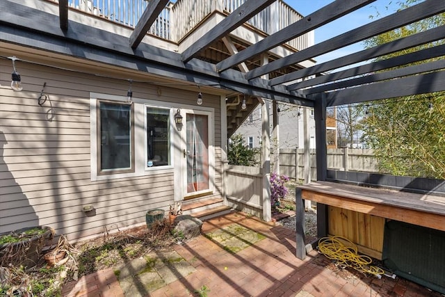 31 Millmont St Unit 1, Boston, MA 02119 - view of patio / terrace with a pergola, fence, and entry steps