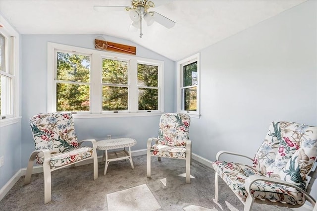 sitting room with lofted ceiling and ceiling fan