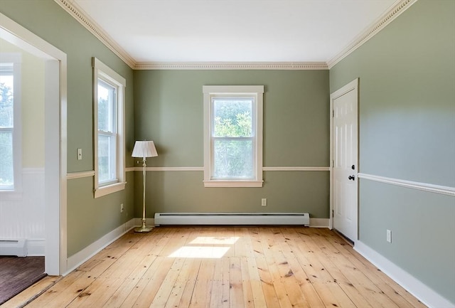 15 Reed St Unit 2, West Boylston, MA 01583 - unfurnished room with a baseboard radiator, hardwood / wood-style flooring, ornamental molding, and baseboards