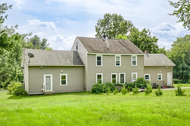 15 Reed St Unit 2, West Boylston, MA 01583 - back of house with a yard, a chimney, and entry steps