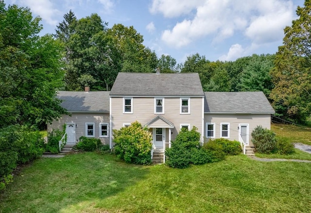 15 Reed St Unit 2, West Boylston, MA 01583 - view of front of home with a front lawn, a chimney, roof with shingles, and entry steps