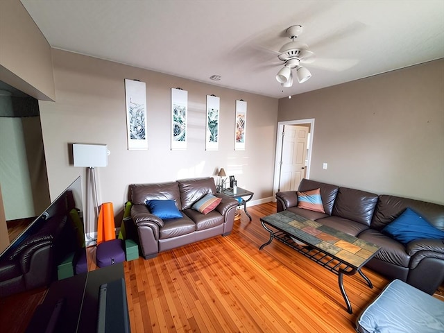 84-86R Cross St, Somerville, MA 02145 - living room featuring ceiling fan, light wood finished floors, and baseboards