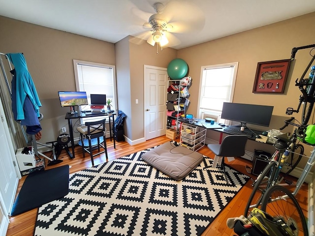 84-86R Cross St, Somerville, MA 02145 - home office with light wood-type flooring, ceiling fan, and baseboards