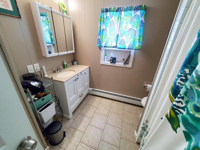 84-86R Cross St, Somerville, MA 02145 - bathroom featuring toilet, a baseboard radiator, vanity, tile patterned floors, and a shower with shower curtain