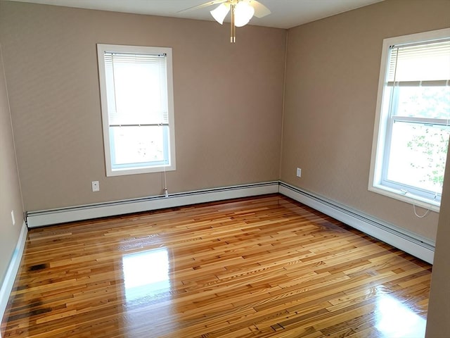 84-86R Cross St, Somerville, MA 02145 - spare room with light wood-type flooring, a baseboard heating unit, a ceiling fan, and baseboards