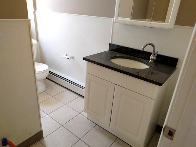 84-86R Cross St, Somerville, MA 02145 - bathroom with a baseboard radiator, vanity, toilet, and tile patterned floors