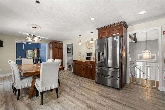 35 Pilgrim Dr, Norwood, MA 02062 - dining area with a chandelier, light wood finished floors, and recessed lighting