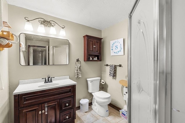 35 Pilgrim Dr, Norwood, MA 02062 - bathroom featuring vanity, a shower stall, tile patterned floors, and a textured ceiling