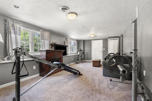 35 Pilgrim Dr, Norwood, MA 02062 - workout room featuring healthy amount of natural light, carpet floors, and a textured ceiling