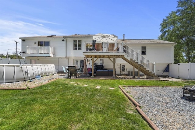 35 Pilgrim Dr, Norwood, MA 02062 - rear view of house featuring a fenced backyard, stairs, a patio area, and a wooden deck